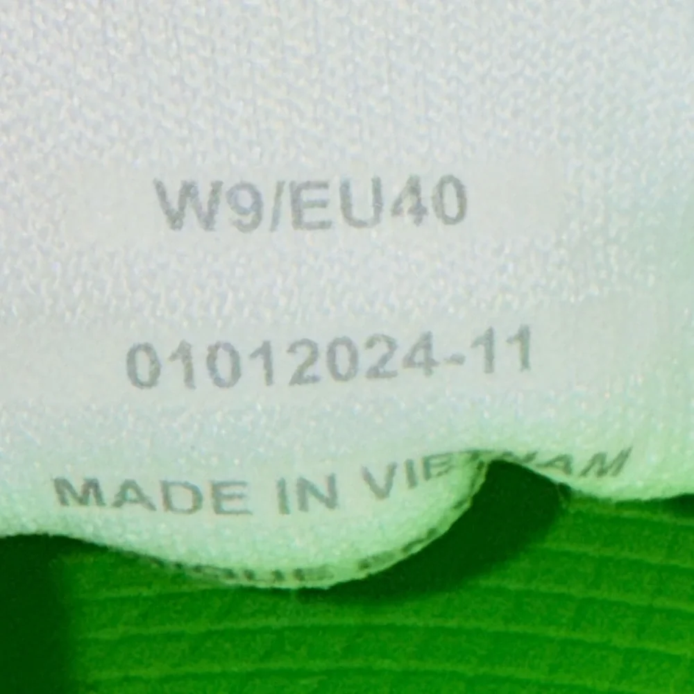 OOFOS Women’s White Athletic Slip-On Sneakers with Light Green Accents - Picture 7 of 8